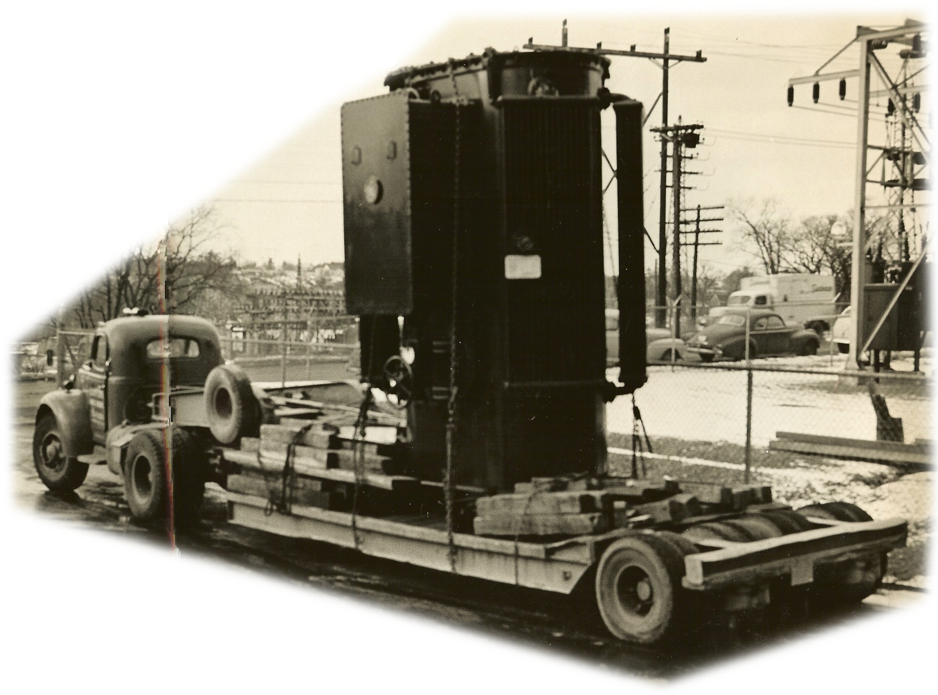 Louis P. Cote, Inc. started in the machinery moving back in the 1940's. Seen here  transporting a large electrical transformer.