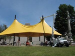 Louis P. Cote, Inc.'s riggers erected a large tent for community events in Manchester NH's Veteran's Park