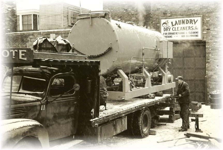 Louis P. Cote, Inc. transports a large boiler for a laundry service in Manchester NH in the 1950s.