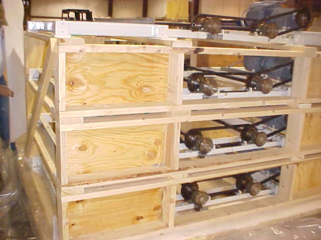 Machinery is crated in preparation for shipping by Louis P. Cote, Inc.'s crating division at it's Goffstown NH warehouse.