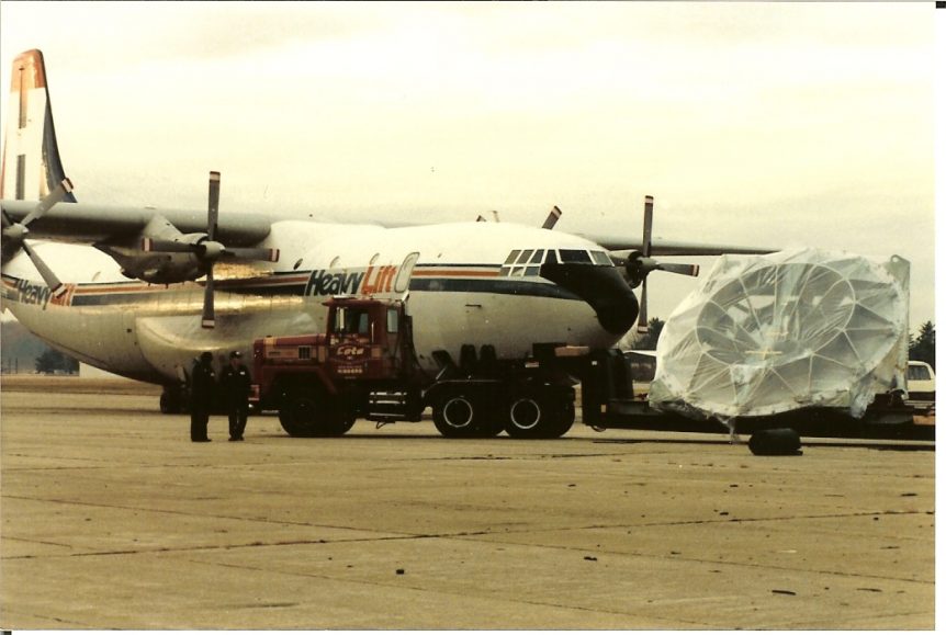 Louis P. Cote, Inc. delivers equipment for transport on board a large cargo plane.