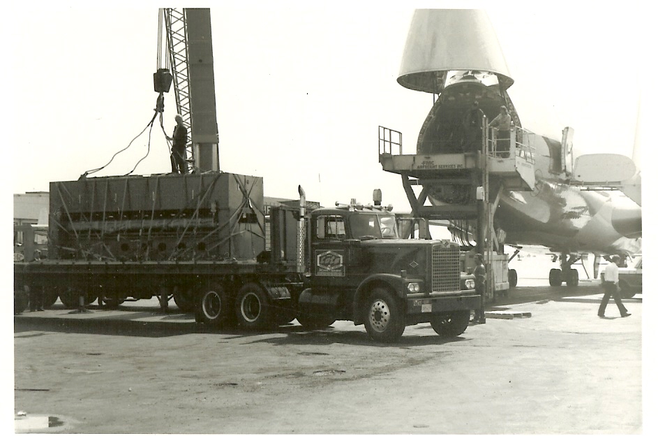 Louis P. Cote, Inc. delivers equipment for transport on board a large cargo plane in the 1960s.